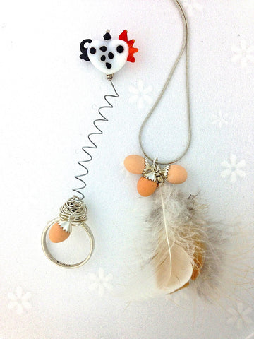 chicken egg with feather necklace and ring set